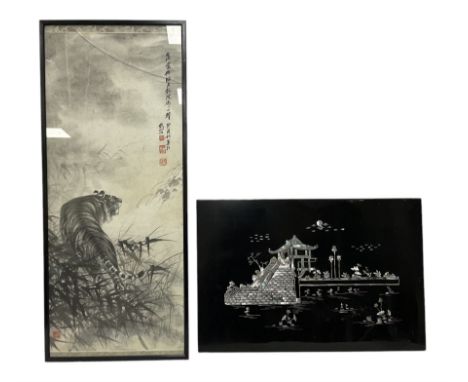 Framed Chinese painted scroll, depicting a tiger in the long grass, together with a black lacquered panel with mother of pear