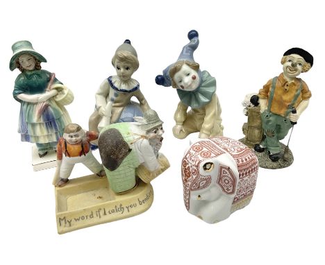 Late 19th/early 20th century German bisque comical novelty vesta holder and striker, the base inscribed 'My Word if I Catch y