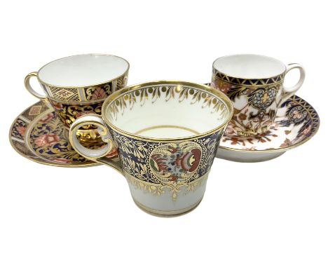 19th century Spode Imari pattern teacup and saucer, pattern 1823, together with Royal Crown Derby teacup and saucer pattern 3