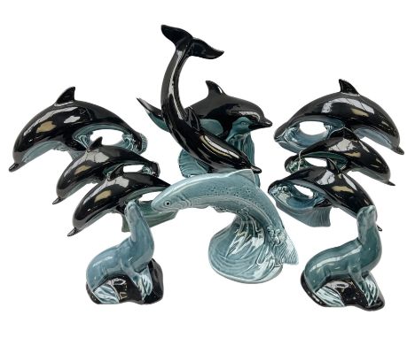 Collection of Poole pottery dolphins,  sea lions, and fish figures, tallest H23cm