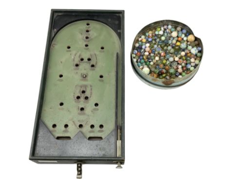 Quantity of vintage glass marbles and bagatelle board, L55cm