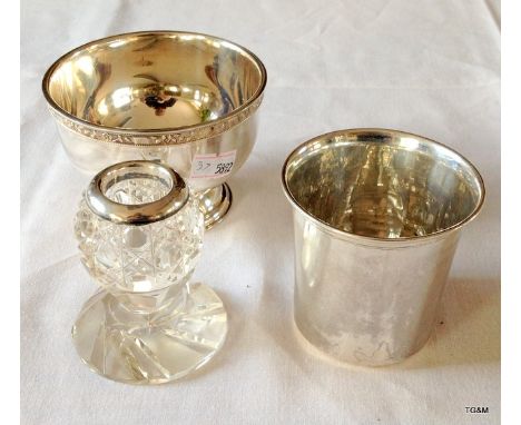 A silver tot flask and a silver topped glass bowl and silver plated dish