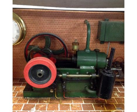 An electrically operated steam traction engine, with water supply and batteries. The fly wheel is marked GOFFTON BRIERLY HILL