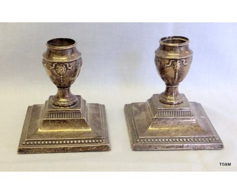 A pair of silver hallmarked dwarf candlestick holders