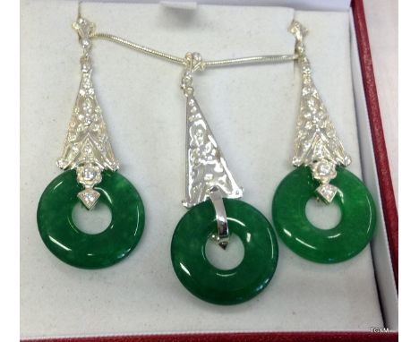 A silver and Jade three piece jewellery set