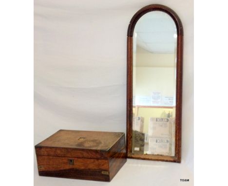 A Walnut with brass writing box/slope and an arch topped bevelled edged wall mirror