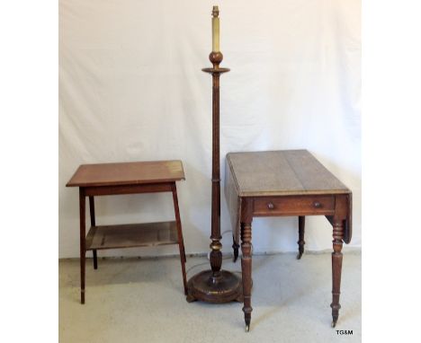 An occasional table, Pembroke drop leaf table on castors and an oak standard lamp