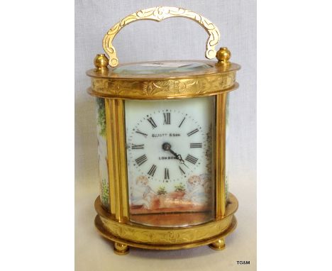 An Elliott and son carriage clock with enamel panelling