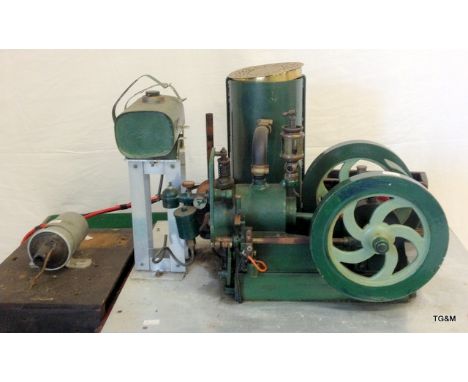 A mounted model petrol stationary engine with water tank and ignition 35 x 59 x 47cm