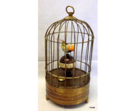 A brass cased Automaton singing bird clock