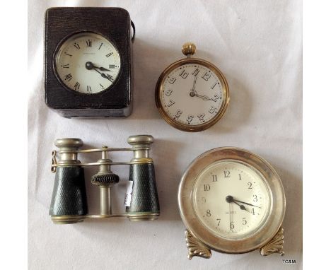 Ansonia carriage clock in case, a silver faced clock, an eight day pocket watch with a set of opera glasses with snake skin c
