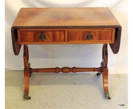 A drop leaf Sofa table