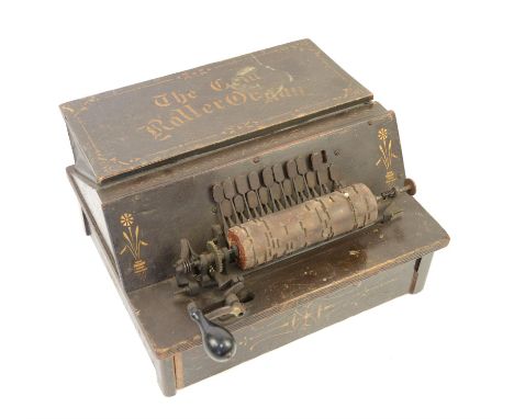 Late 19th century twenty-key "Gem Roller Organ", in painted wooden case, with one music cylinders, 37 x 31cm height 19.5cmPro
