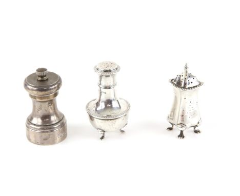 Silver pepper grinder by Park Green and Co Ltd with Peter Pieper London 1960 and two silver pepper pots, Birmingham 1912 and 