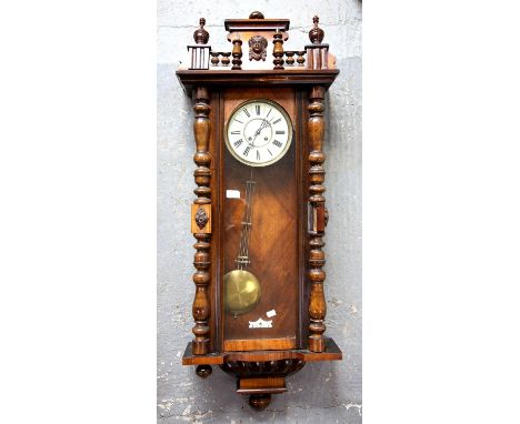 20th century mahogany Vienna Regulator style wall clock, dial with Roman numerals, the glaze door flanked by turned pilasters