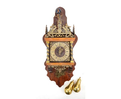 Early 20th century Dutch wall clock, with Wuba movement, with brass finial and Atlas holding the world above the chapter ring