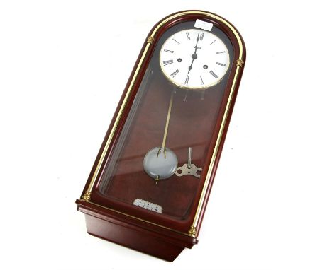 German Hermle wall clock, the dial with Roman numerals, twin train movement, the arched case with glazed door, h52cm w22cm, w