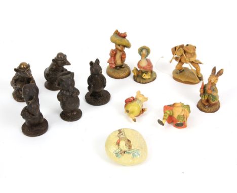 Set of Beatrix Potter enamel pill boxes, to include 'Samuel Whiskers', 'Pigling Bland', 'Mr Jeremy Fisher', among others (9),