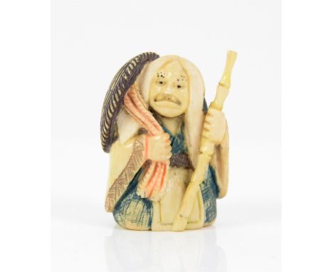 Meiji period Japanese ivory netsuke, representing an elderly lady holding a stick and a hat, signed to base, h4.5cm 