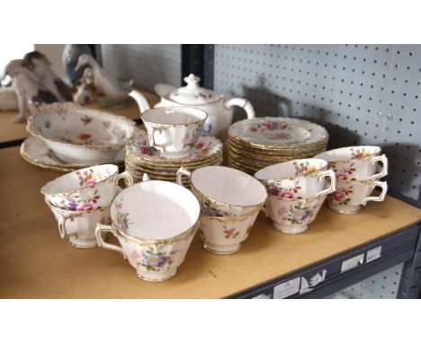 Royal Crown Derby Posies part tea service, comprising 11 teacups, 12 saucers, 12 side plates, a teapot and 2 plates, together