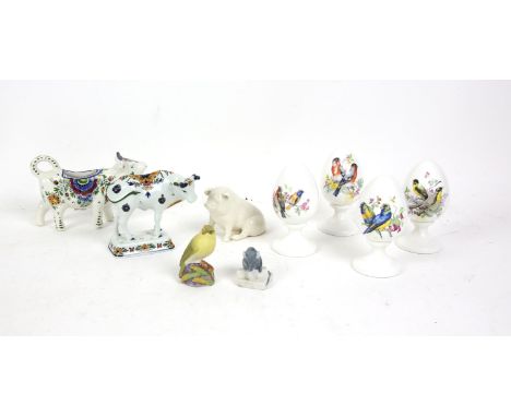 Set of four Crown Staffordshire eggs on stands, decorated with birds (height 12cm), with a pair of ceramic cows, a Belleek pi