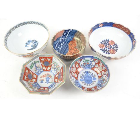 A Collection of Imari Japanese ceramic iincluding a vase, 24cm high , A pair of jars, 17cm high (with the cover), five large 