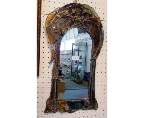 A John Leathwood signed wall mirror, the mirror with arched top with coloured glass surround 