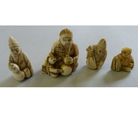 Four ivory Netsuke 