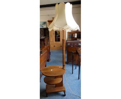 An Art Deco walnut 3-tier lamp table with rise and fall action