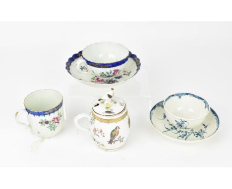 An 18th century Meissen porcelain barrel-shaped mustard pot, painted with birds, butterflies and flowers beneath a gilt embel