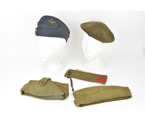 First World War and later items to include a WWI Derby Scheme armband, dated 1939 Spanish Legion Cap, British army side cap, 