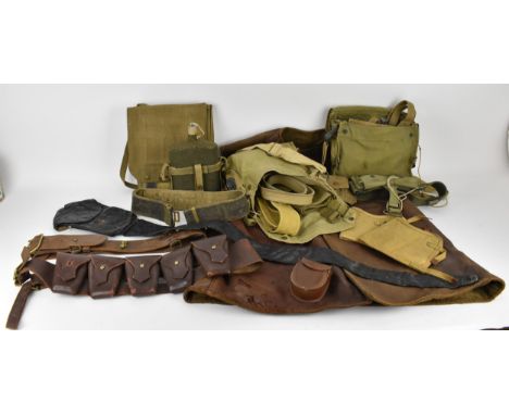 Mixed British army uniform webbing items and others comprising of 19th/20th century black leather scabbard cover, brown leath