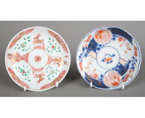 A JAPANESE PORCELAIN IMARI SAUCER early 18th century, with a shaped rim, 12cm diameter; together with another Japanese Imari 