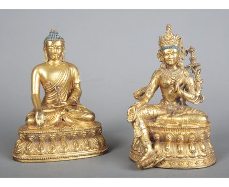 TWO SIMILAR SINO-TIBETAN GILT BRONZE BUDDHAS20th century, including a seated figure of the bodhisattva Tara, modelled wearing