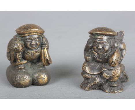TWO SIMILAR JAPANESE BRONZE OKIMONOboth inscribed to the base, one depicting Daikokuten, the other Ebisu, 3.5cm high (2)