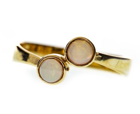 OPAL TWO STONE RING, set with two round cabochon cut opals each approximately 3.6mm diameter, in nine carat gold, size Q, 1.8