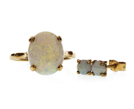 OPAL RING, set with a cabochon cut opal 12mm long, in nine carat gold; along with a pair of opal stud earrings, in nine carat