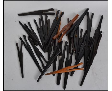 A collection of approx 30 Victorian and Edwardian vintage glove stretchers of typical form in ebony and other woods. Please s