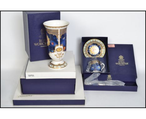 A collection of boxed Royal Worcester Millennium collection 2000 AD ceramics to include a cup saucer and side plate trio, lar