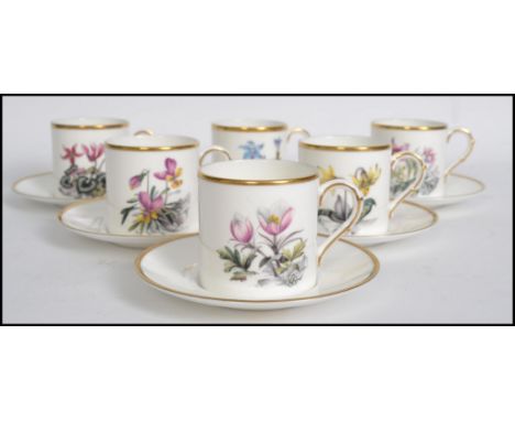 A Royal Worcester coffee can service having a decorative chintz pattern comprising cups, saucers etc being stamped to the bas