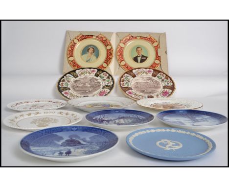 A collection of 11 boxed ceramic collectors plates to include examples by Masons, Coalport, Spode and others ( please see ill