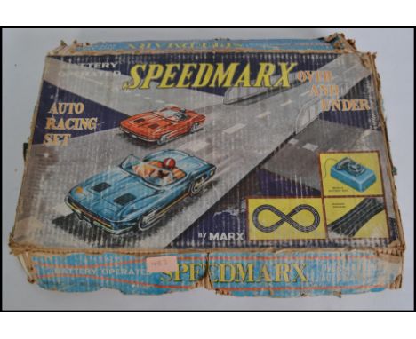 A vintage Speedmarx toy set complete with the original box to include track and cars etc ( please see images )&nbsp;
