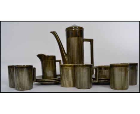 A retro 20th century vintage 6 person coffee service by Ellcreave Tiko in green consisting of 6 cups and saucers, creamer jug