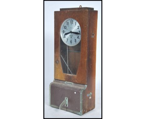A vintage 20th century industrial factor&nbsp;French wooden cased clocking in / time clock by Pantax having an opening glass 