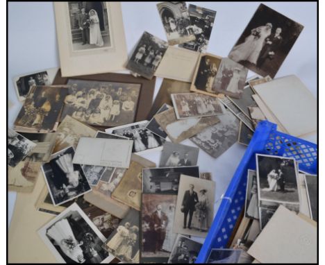 A collection of vintage photographs dating from the early 20th century, consisting of mainly bridal photographs some being of