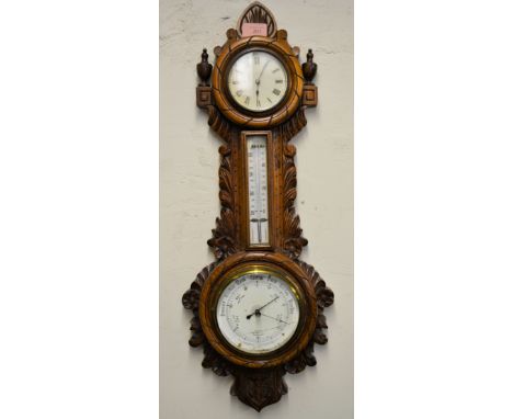 A vintage 20th century banjo clock / barometer with thermometer, the silvered barometer dial within a shaped foliate case