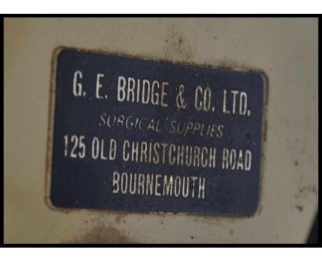A retro 1950's Bridge &amp; Co beehive style desk lamp being recently converted. The space age style pendant shade over paint