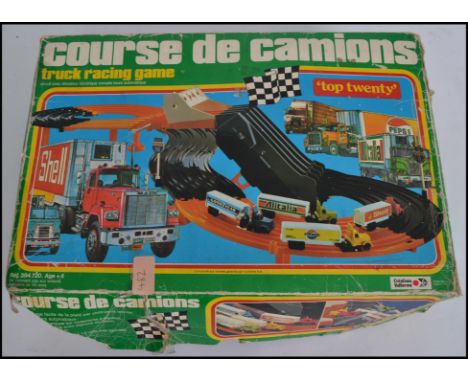 An unusual vintage 20th century French Course De Camions truck racing game - slot car. In the original box appearing complete