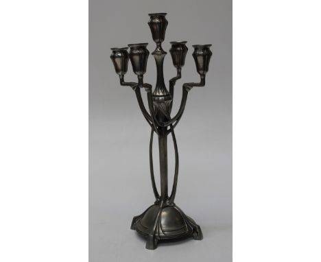A late 19th/ early 20th century Albert Mayer-type pewter five light table candlestick of organic Art Nouveau form. 45cm high