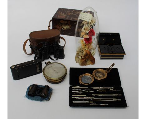 A mixed collector's lot including an Edwardian steel deed box, a cased pair of German field glasses, a sealed glass dried flo